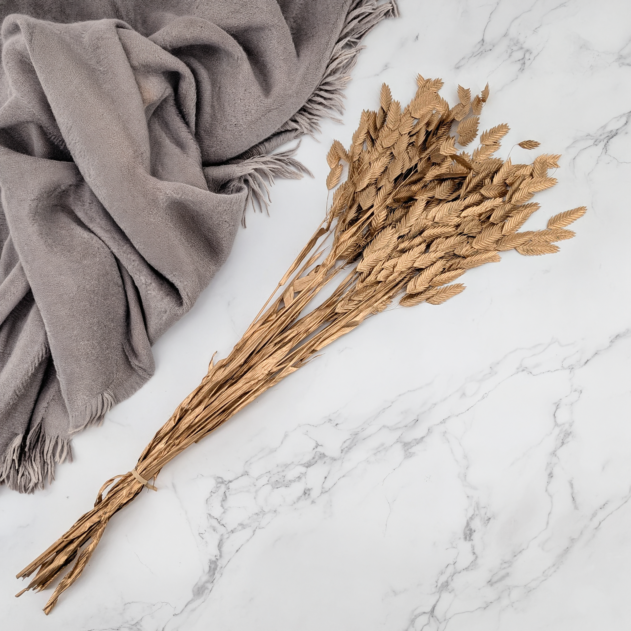 Gold dried Chasmanthium latifolium for floral decorations